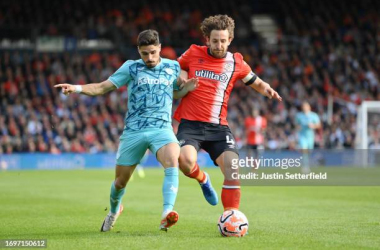 Pedro Neto (l.) and Tom Lockyer (r.) battle for the ball during Luton Town and Wolverhampton Wanderers' draw at Kenilworth Road/Photo: Justin Setterfield/Getty Images