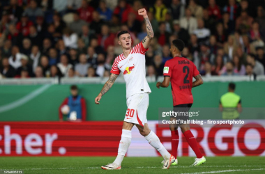 Benjamin Šeško celebrates after scoring a goal for RB Leipzig in the DFB Pokal (Photo by Ralf Ibing - firo sportphoto/Getty Images)