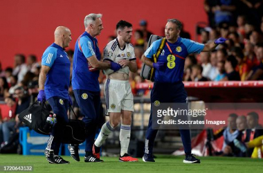 Andy Robertson walks off injured during Scotland duty. (Photo by David S. Bustamante/Soccrates/GettyImages)