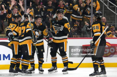 Penguins surge past Flames with five-goal outburst in third period