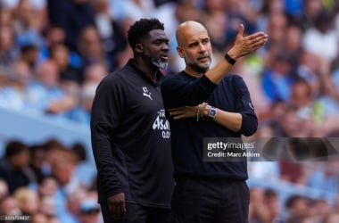 Kolo Toure and Pep Guardiola. (Photo by Marc Atkins/Getty Images)