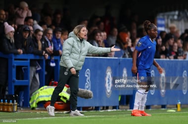 Sonia Bompastor speaks to her team from the sidelines against Everton (Photo by Alex Davidson - WSL/WSL Football via Getty Images)