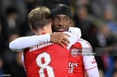 Martin odegaard and Noni Madueke. (Photo by Stuart MacFarlane/Arsenal FC via Getty Images)