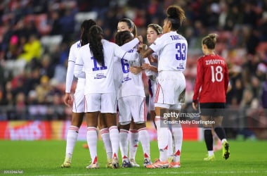 Lyon celebrate their third goal of the night (Photo by Molly Darlington/Getty Images)