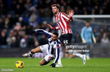WEST BROMWICH, ENGLAND - DECEMBER 12: Karlan Grant of West Bromwich Albion is challenged by Patrick Bamford of Sheffield United during the Sky Bet Championship match between West Bromwich Albion and Sheffield United at The Hawthorns on December 12, 2025 in West Bromwich, England. (Photo by Naomi Baker/Getty Images)