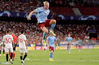 Erling Haaland celebrates scoring Manchester City's third goal against Sevilla. (Photo by David S. Bustamante/Soccrates/Getty Images.