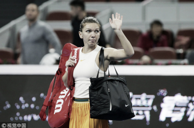 Halep desiste após perder primeiro set e Jabeur avança em Pequim