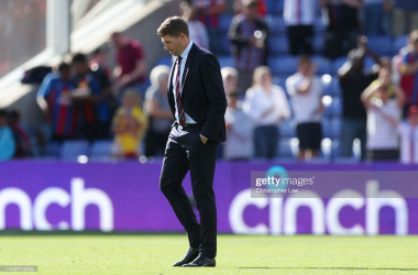 Gerrard walks off disappointed after his team was beaten by Crystal Palace at Selhurst Park.