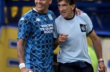 Marcos Rojo y Gustavo Costas, en la previa del partido frente a Boca.