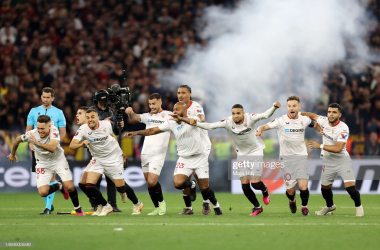Sevilla players celebrate winning the penalty shootout (Photo by Maja Hitij/Getty Images)