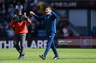 Mike Jackson celebrates at full-time after Burnley beat Wolverhampton Wanderers: Gareth Copley/GettyImages