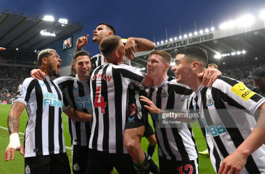 The Newcastle team celebrate Bruno Guimaraes' goal against Brighton which inevitably sealed Champions League football for the Magpies. Image courtesy of Getty Images (Stu Forster)