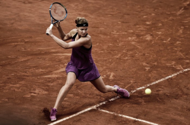 Safarova emerge la lluvia