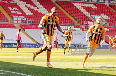 Lincoln City 1-2 Hull City: Tigers promoted following hard fought win at Lincoln