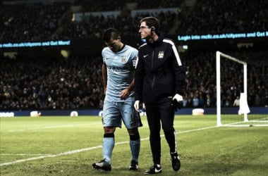 Aguero out for at least a month with knee injury