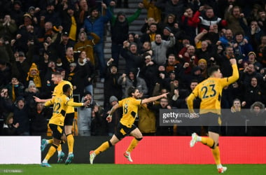 WOLVERHAMPTON, ENGLAND - FEBRUARY 20: Ruben Neves of Wolverhampton Wanderers celebrates after scoring their team's first goal during the Premier League match between Wolverhampton Wanderers and Leicester City at Molineux on February 20, 2022 in Wolverhampton, England. (Photo by Dan Mullan/Getty Images)