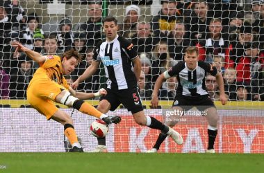 <div>NEWCASTLE UPON TYNE, ENGLAND - JANUARY 08: Cambridge striker Joe Ironside shoots to score the winning goal during the Emirates FA Cup Third Round match between Newcastle United and Cambridge United at St James' Park on January 08, 2022 in Newcastle upon Tyne, England. (Photo by Stu Forster/Getty Images)</div>