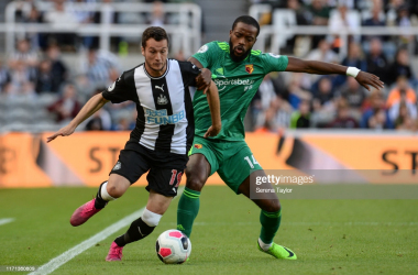 <div>NEWCASTLE UPON TYNE, ENGLAND - AUGUST 31: Javier Manquillo of Newcastle United (19) and Nathaniel Chalobah of Watford FC (14) jostle for the ball during the Premier League match between Newcastle United and Watford FC at St. James Park on August 31, 2019 in Newcastle upon Tyne, United Kingdom. (Photo by Serena Taylor/Newcastle United via Getty Images)</div>
