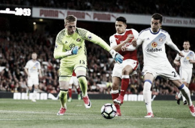 Pickford no puede evitar que el Arsenal siga soñando con la Champions