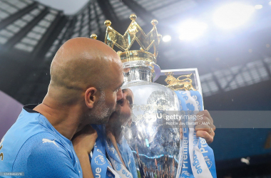 <div class="AssetCard-module__caption___nD2x1" data-testid="caption" style="box-sizing: inherit; padding-bottom: 14px;">MANCHESTER, ENGLAND - MAY 22: Pep Guardiola the head coach / manager of Manchester City kisses the Premier League trophy during the Premier League match between Manchester City and Aston Villa at Etihad Stadium on May 22, 2022 in Manchester, United Kingdom. (Photo by Robbie Jay Barratt - AMA/Getty Images)</div>