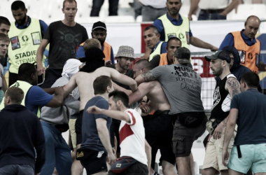 Russia handed suspended disqualification after stadium violence
