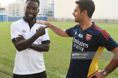 Bacary Sagna with Mikel Arteta after a training session in Dubai.&nbsp;&nbsp;(Photo by Stuart MacFarlane/Arsenal FC via Getty Images)