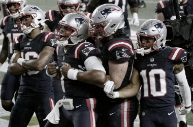 Bajo un diluvio, New England supera a los Ravens