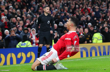 MANCHESTER, ENGLAND - FEBRUARY 15: Cristiano Ronaldo of Manchester United celebrates after scoring his first go during the Premier League match between Manchester United and Brighton & Hove Albion at Old Trafford on February 15, 2022 in Manchester, England. (Photo by James Gill - Danehouse/Getty Images)