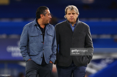 <span>Behdad Eghbali walks with Todd Boehly across the pitch after the UEFA Champions League quarterfinal second leg match between Chelsea FC and Real Madrid&nbsp;</span><span>(Photo by Clive Rose/Getty Images)</span>