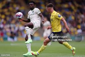 <span style="color: rgb(8, 8, 8); font-family: Lato, sans-serif; font-size: 14px; font-style: normal; text-align: start;">OXFORD, ENGLAND - AUGUST 10: Amankwah Forson (in the white kit) of Norwich City in action during the Sky Bet Championship match between Oxford United FC and Norwich City FC at Kassam Stadium on August 10, 2024 in Oxford, England.</span>