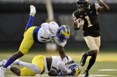 Wake Forest loses Hinton, but beats Delaware 38-21