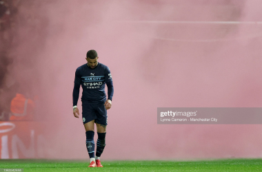 <div>SWINDON, ENGLAND - JANUARY 07: Kyle Walker of Manchester City walks out of a flare during the Emirates FA Cup Third Round match between Swindon Town and Manchester City at The County Ground on January 07, 2022 in Swindon, England. (Photo by Lynne Cameron - Manchester City/Manchester City FC via Getty Images)</div><div><br></div>