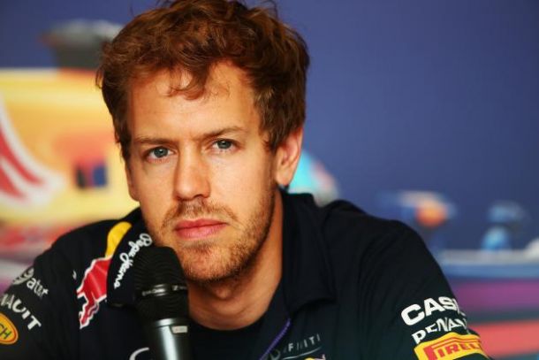 Vettel Takes Ferrari Seat For 2015