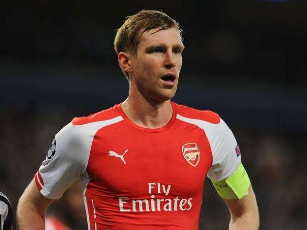 Per Mertesacker eyeing top two finish and FA Cup glory