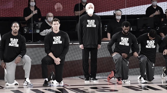 San Antonio Coaches Stand For The Anthem