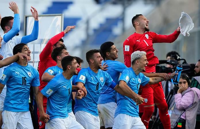 Venezuela players celebrate at the end of a South America U-20