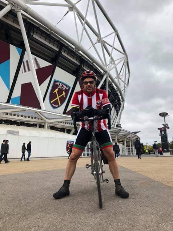 Meet the Sheffield United fan cycling to every Premier League away game for charity