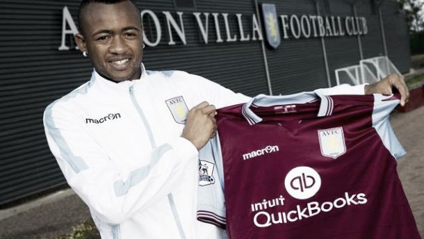 Ayew pictured holding a Villa shirt (photo: AVFCTwitter)