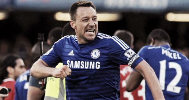 Terry celebrating after Chelsea's 0-0 draw with Arsenal all but wrapped up the title.