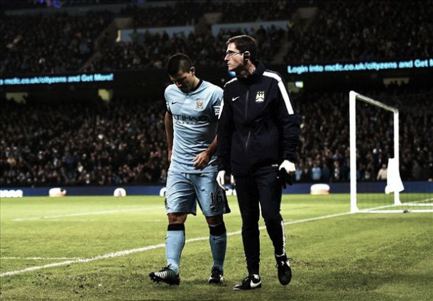 Aguero out for at least a month with knee injury