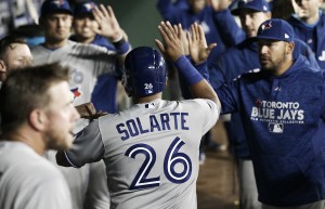Blue Jays hold off late Rangers rally to win first road game of 2018
