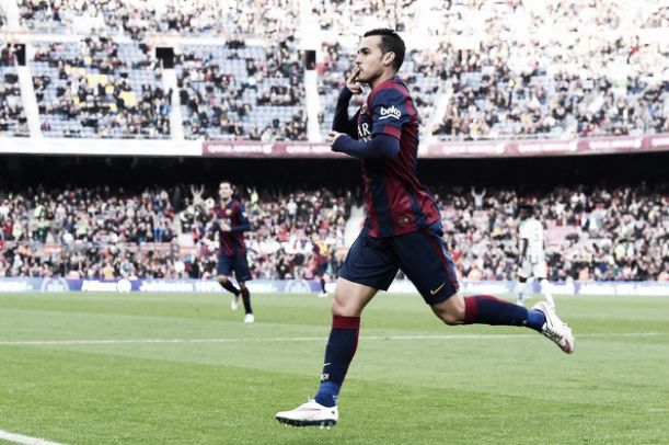 Pedro celebrates a goal at the Nou Camp