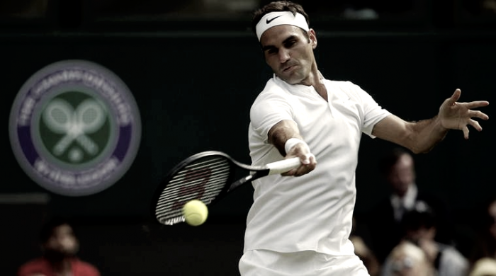 Dolgopolov desiste e Federer avança à segunda rodada de Wimbledon