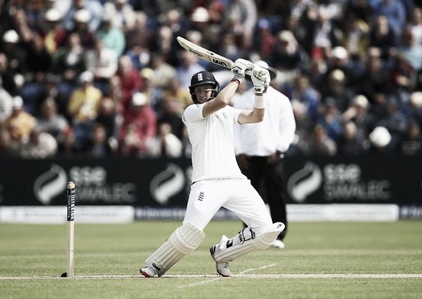 Root scores ton on absorbing first day in Cardiff
