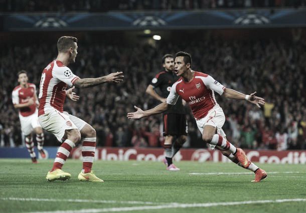 Sanchez sends Arsenal into Champions League