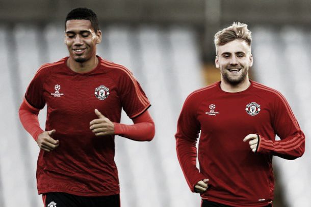 Luke Shaw with Chris Smalling for Manchester United