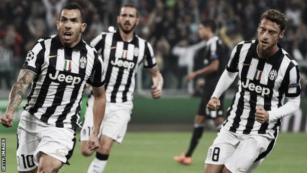 Juventus 2-1 Real Madrid: Carlos Tevez penalty gives Juventus the advantage in the Champions League semi-final